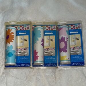 Three rolls of pre-pasted wallpaper border with flower print